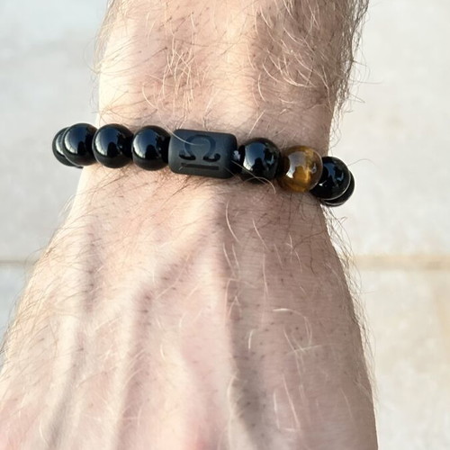 Unisex bracelet with black and brown beads like new