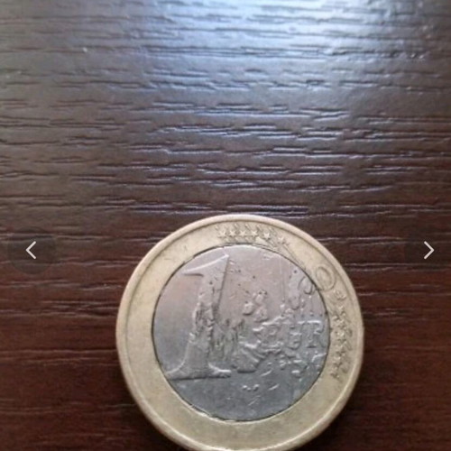 1€ coin used with two minting errors