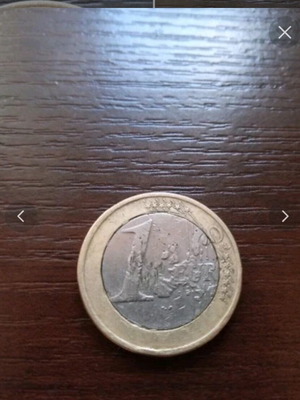 1€ coin used with two minting errors