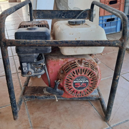 Honda 5.5 generator used, petrol, needs base replacement and service