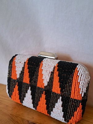 Clutch bag like new with beads in geometric pattern