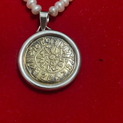 Pearl necklace with silver-gold pendant LALAOUNIS A21 used, 42 cm double-sided