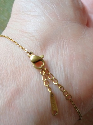 Steel bracelet chain eye design like new, gold color