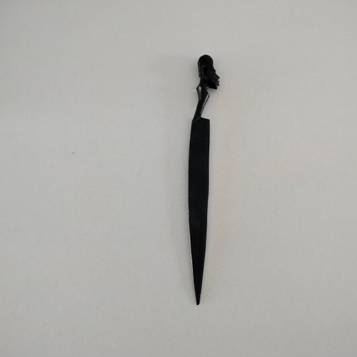 Ebony wood paper cutter used