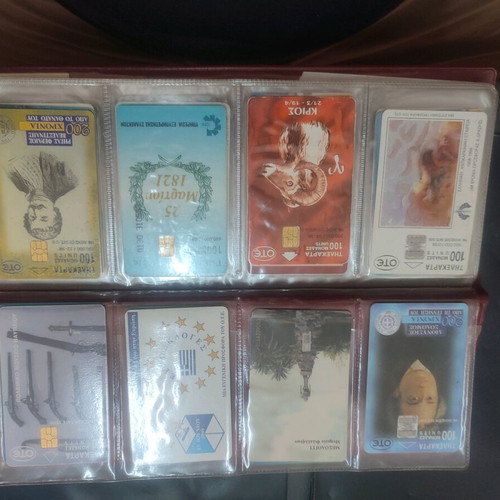 Phone cards used, album with 66 pieces