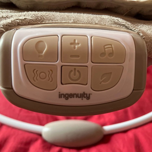 Relax Ingenuity baby bouncer used with music, vibration and light