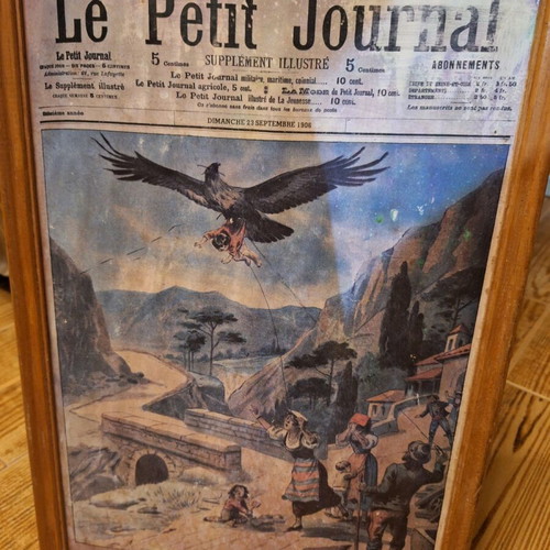 Wooden frame with Le Petit Journal front page used