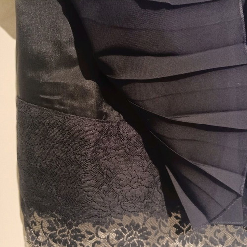 Attrattivo mini skirt like new, size Small, black with lace trim