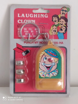 Laughing Clown keychain new, 1980s