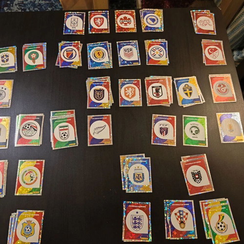 Panini FIFA World Cup 2026 foil team badges and group photos stickers