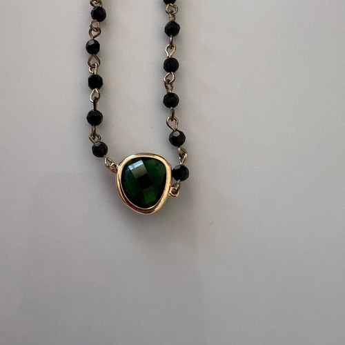 Necklace with steel elements like new, green and gold