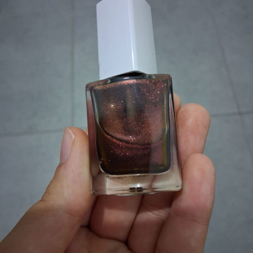 Brown shiny nail polish used