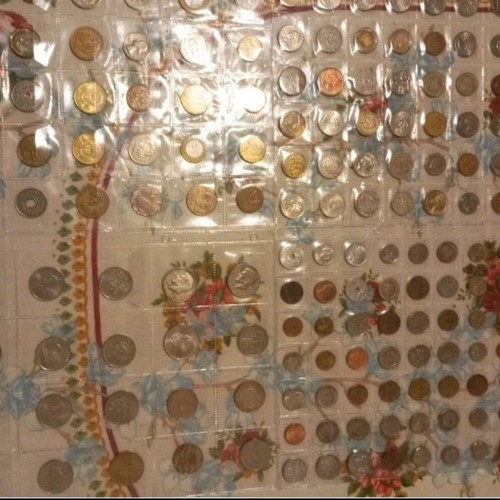 Coin album used with 159 coins from various countries