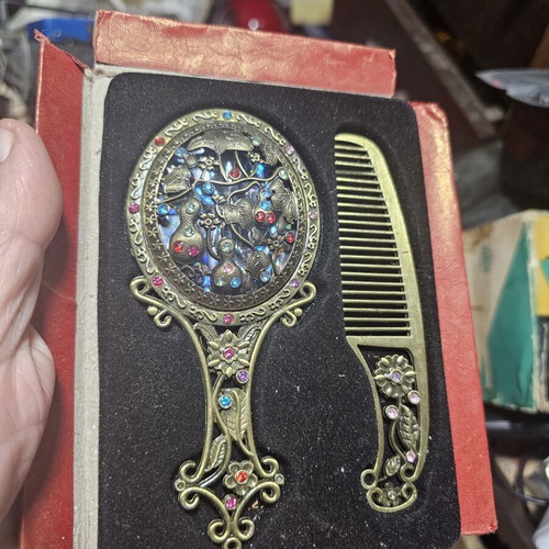 Vintage mirror and comb set