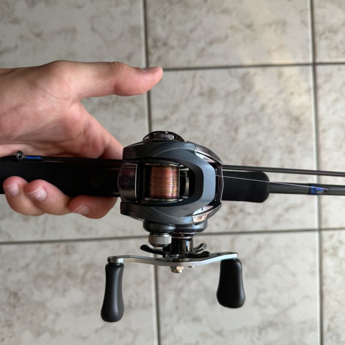 Saurus 702 spinning fishing rod with Doman reel