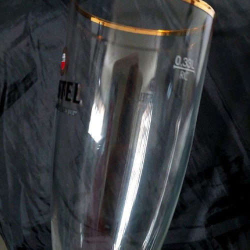 Amstel beer glass with a golden rim