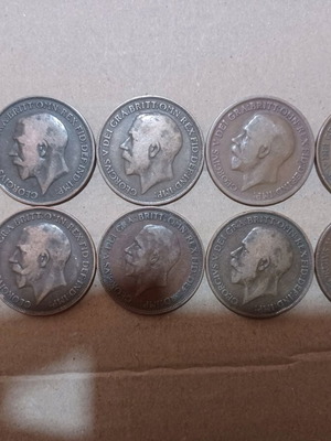 English One Penny George V coins used, various dates 1910s–1930s