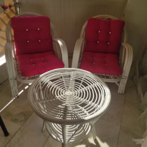 Balcony chairs and table used, white color