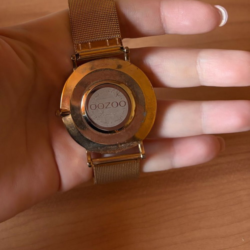 Oozoo gold watch like new, few missing rhinestones