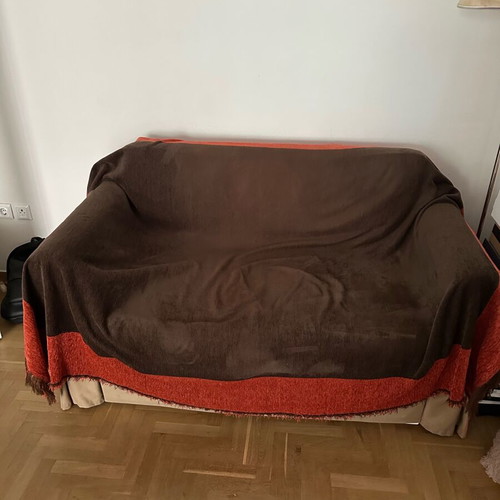 Beige two-seater sofa bed like new with storage space