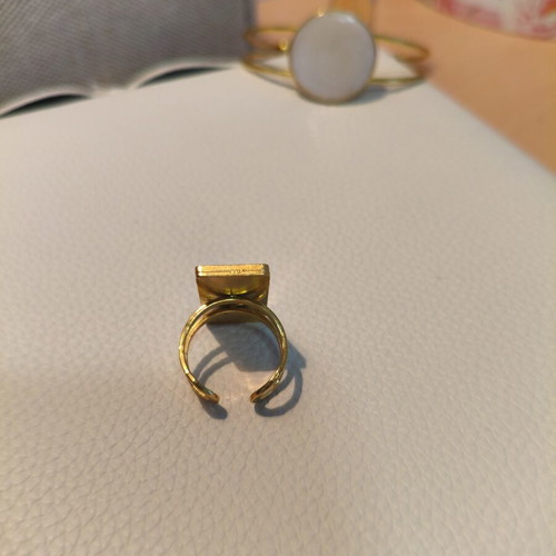 Handmade adjustable statement ring with white resin and gold base