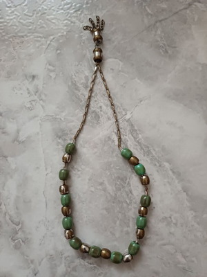 Grandpa's worry beads used, traditional with metal chain and green beads