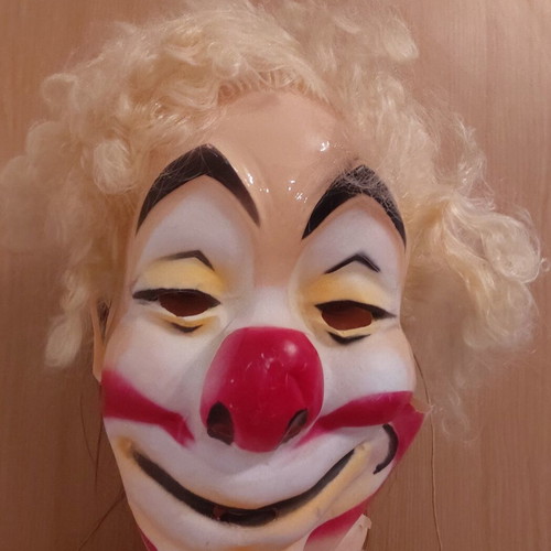 Vintage clown carnival mask from the 70s, used