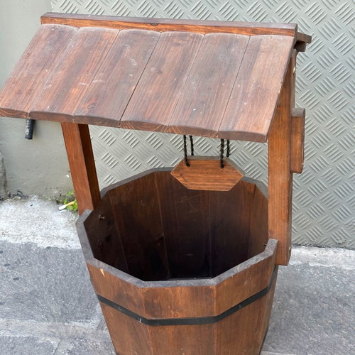 Decorative wooden wishing well for planter used
