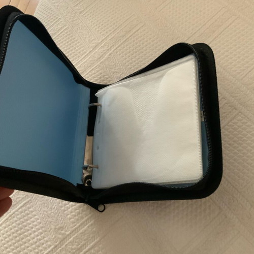 CD case like new, holds 24 CDs, ideal for car use