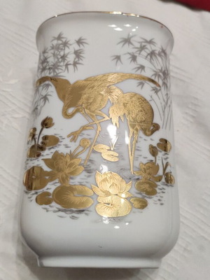 Porcelain vase used, height 16 cm