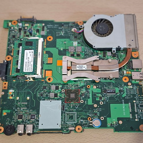 Toshiba Satellite L300 6050A2175001 MB A02 motherboard used with RAM, processor, and cooling
