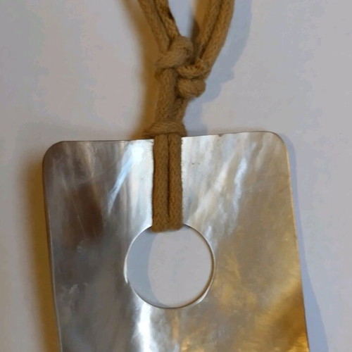Pendant used made of shell