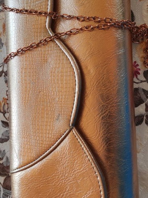 Clutch bag gold with snake effect and chain strap like new
