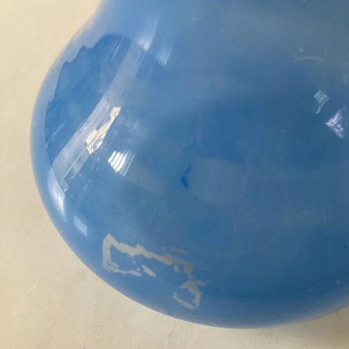 Flower vase used, very thin glass pale blue with wavy opening