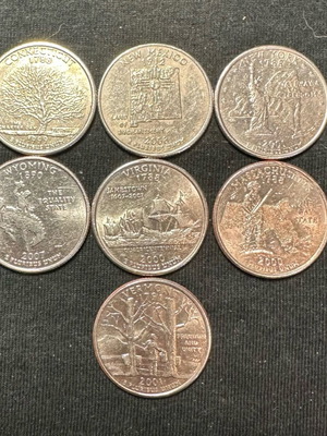 Lot of 7 used State Quarters of America
