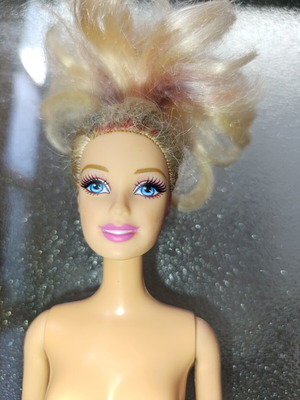 Barbie doll used