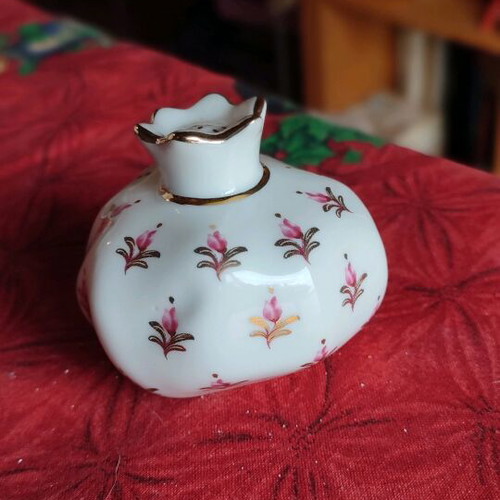 Porcelain pomegranate charm like new with gold leaf detail