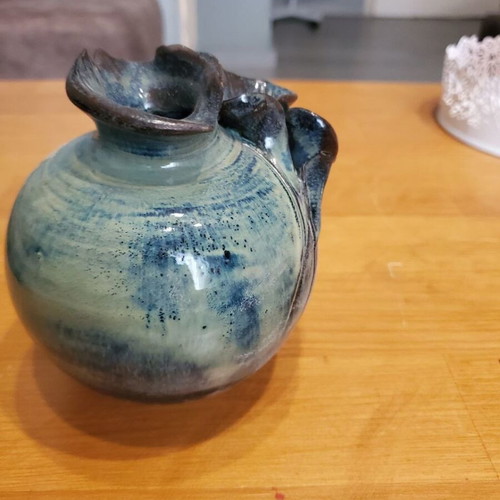 Handmade ceramic vase with embossed petals like new