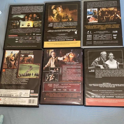 6 DVDs with movies starring Mel Gibson, Brad Pitt, Connery, Eastwood, Richard Gere, Vin Diesel