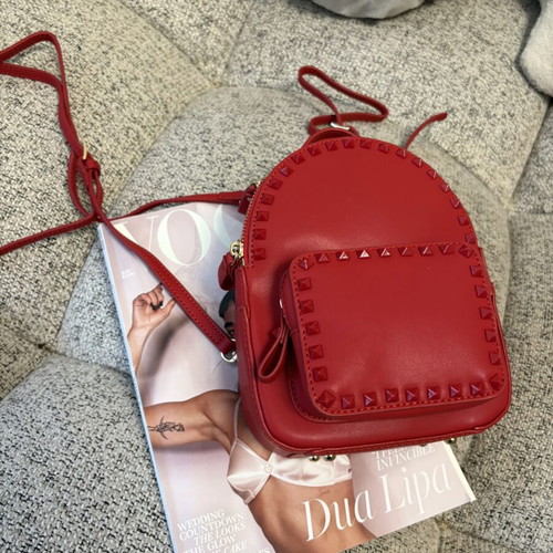 Backpack made of natural leather like new, small red