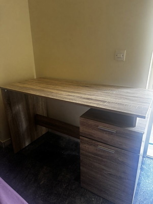 Wooden desk with drawer and open storage, brown oak finish