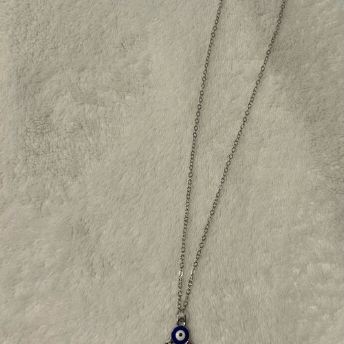 Handmade eye necklace in palm new