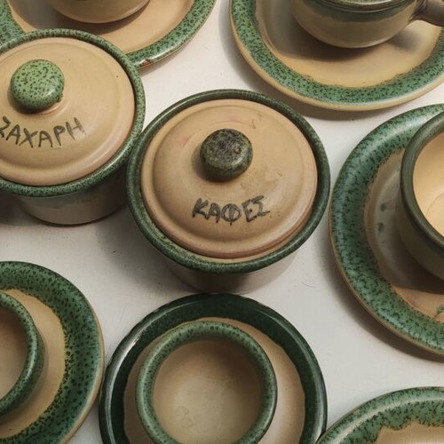 Clay tea and coffee set like new, 4 tea cups, 4 coffee cups, sugar and coffee containers, jug