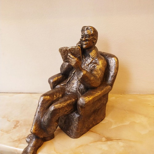 Sculpture of a Man Reading a Book, New