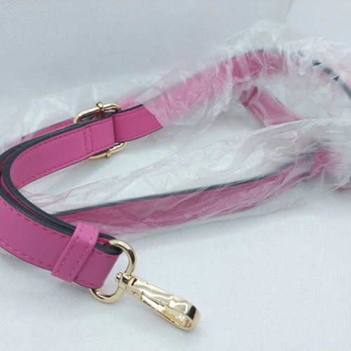 Adjustable bubblegum pink bag strap