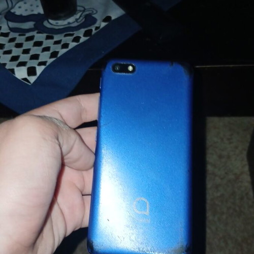 Alcatel phone used with cracks and scratches blue