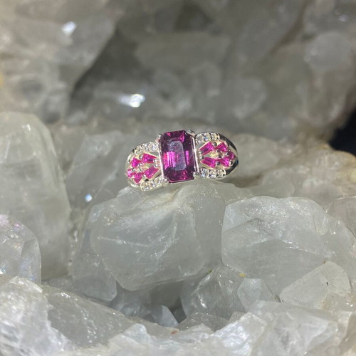 Silver ring with natural rhodolite garnet and moissanite