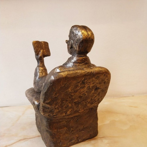 Sculpture of a Man Reading a Book, New