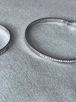 Hoop earrings large with rhinestones used, silver color