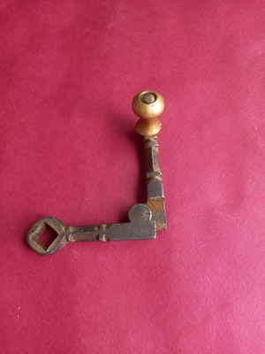 Metal key for old grinding mill